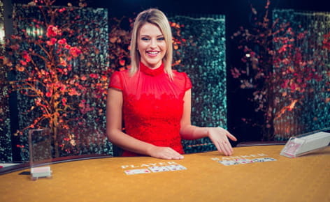 Eine Live Baccarat Dealerin im Online Casino.