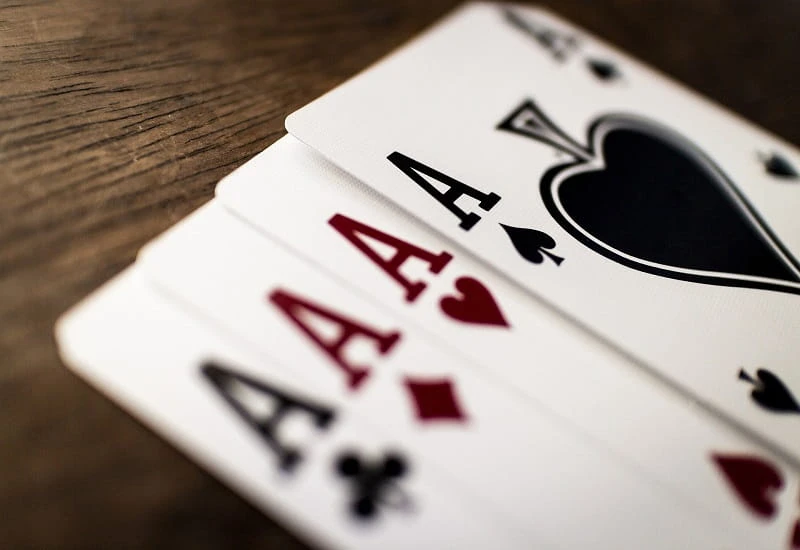 Die vier Asse eines Kartenspiels.