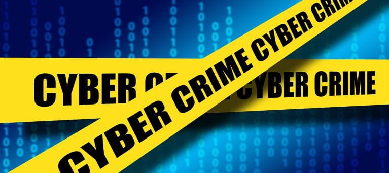 Auf Absperrband steht Cyber Crime.