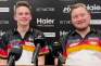 Aufnahme von Martin Schindler und Ricardo Pietreczko auf einer Pressekonferenz beim World Cup 2025.
