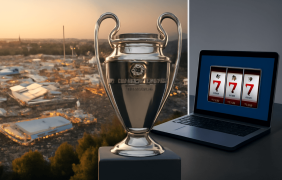 Panoramablick auf das Oktoberfest, der Champions-League-Pokal und ein Laptop, auf dem Slots gespielt werden.